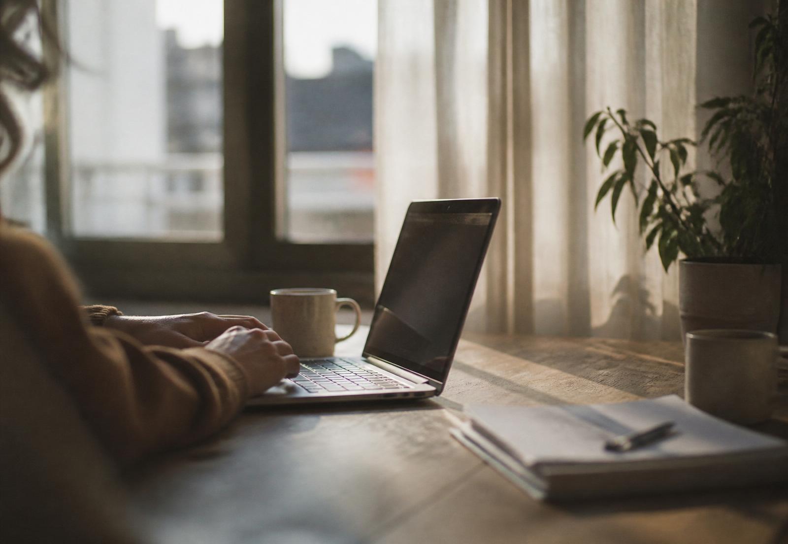 A calm workspace with a laptop in natural afternoon light